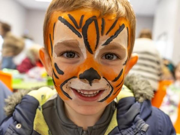 Boy with tiger face painting