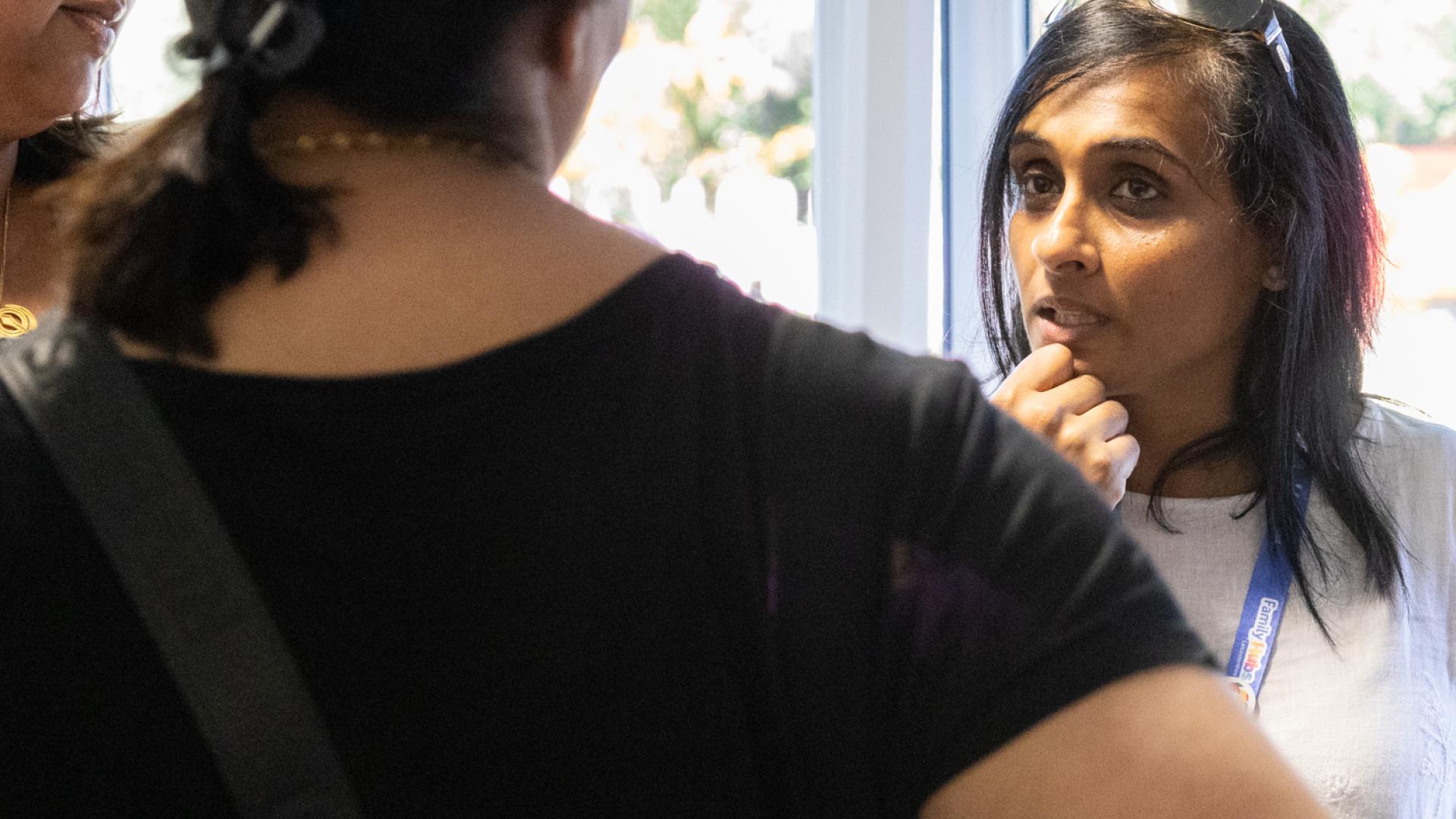 women talking in a small group